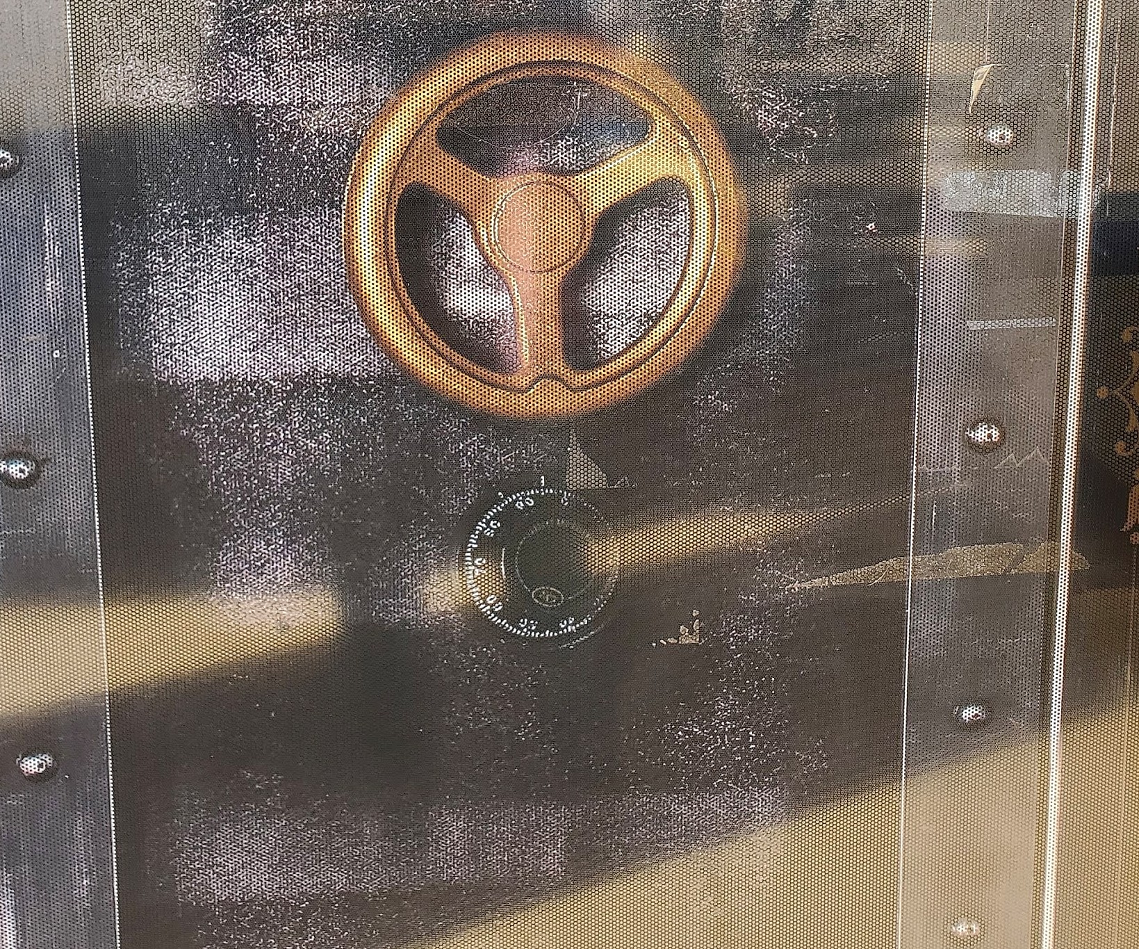 Vault-style front door of the shop