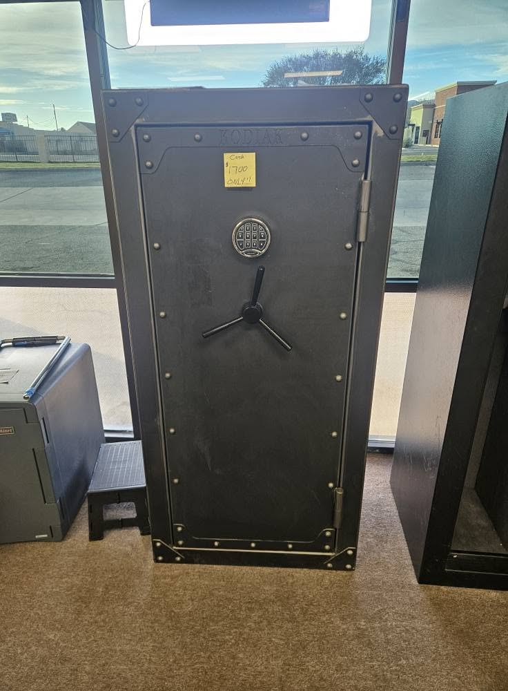 Dark steel gun safe with a spoke handle